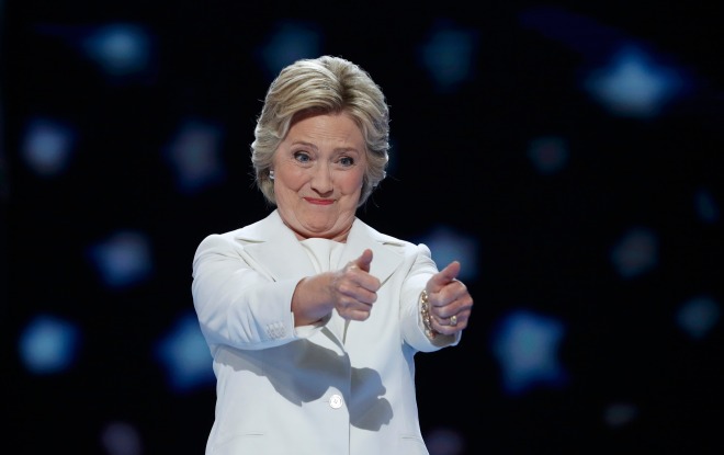Democratic presidential nominee Hillary Clinton gives two thumbs up as she arrives to accept the nomination on the fourth and final night at the Democratic National Convention in Philadelphia